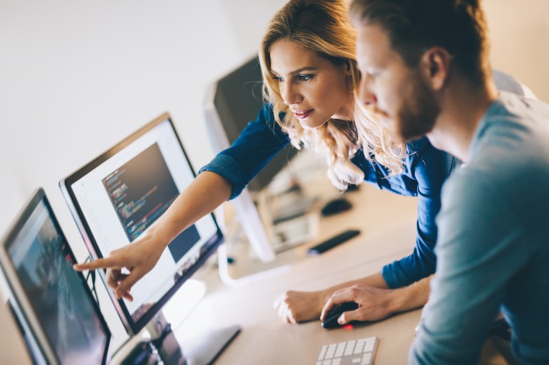 Timly App Inventory Management shown by two people using computers