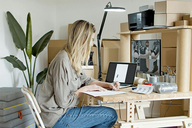 A woman using types of inventory management