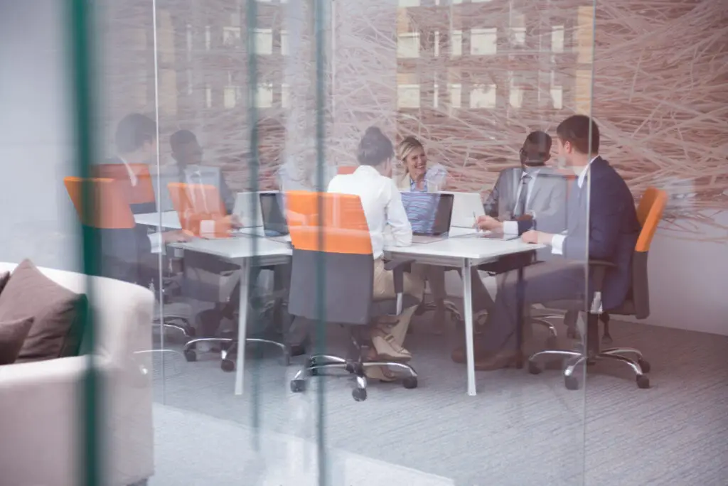 Inventory Management being discussed by a team in an office