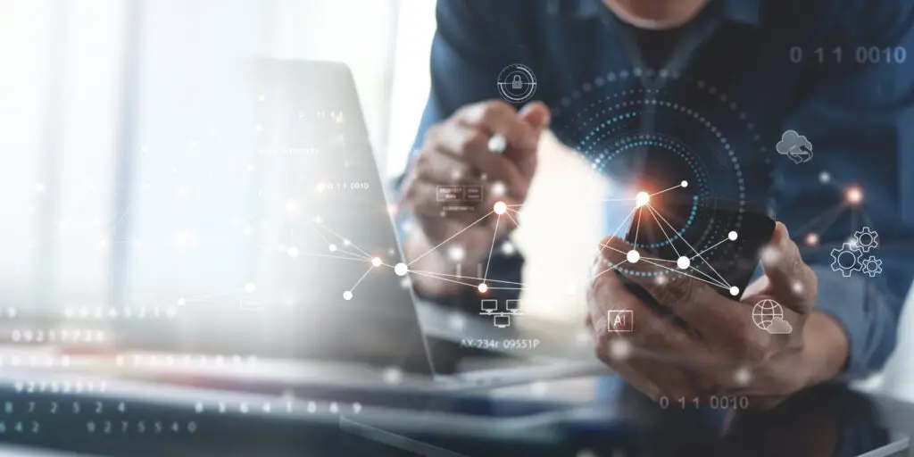 Persona interactuando con interfaz digital conectada, ilustra redes y sistemas inteligentes IIoT.