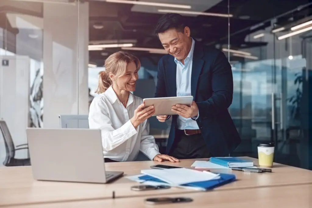 Employees taking about smart IT Asset Tagging